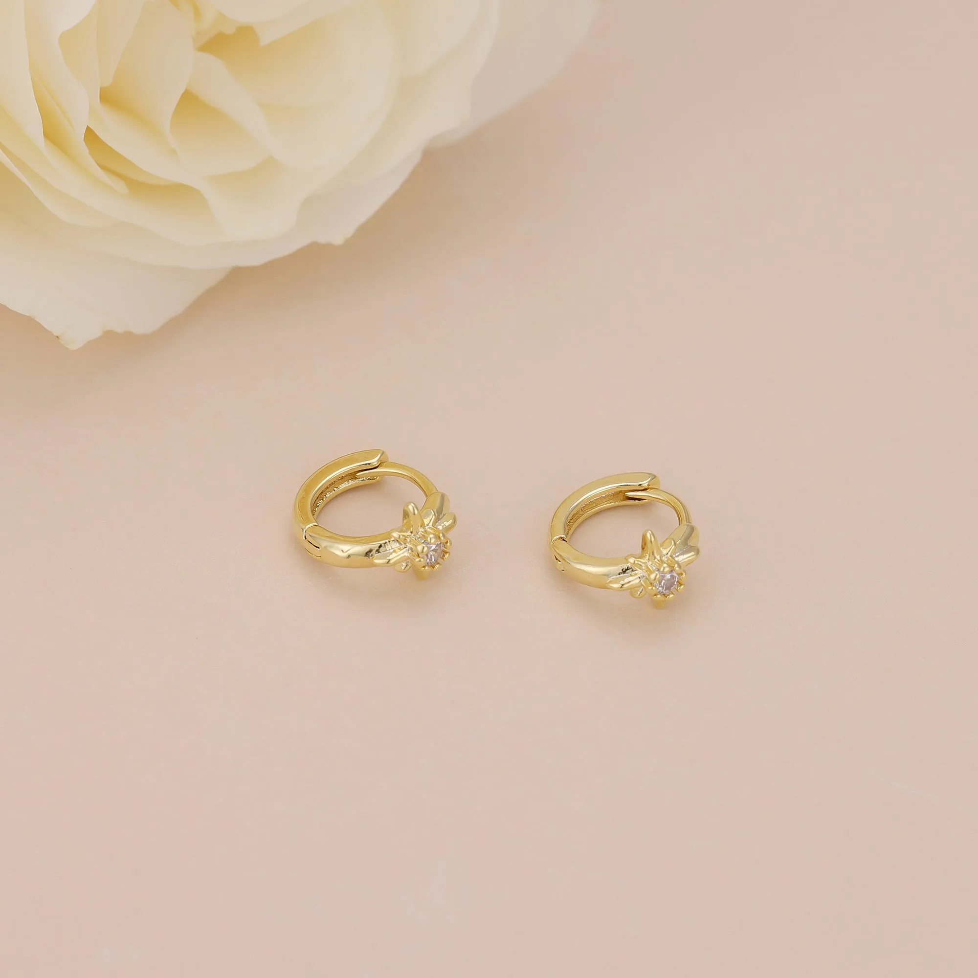 E168 celestial dainty starburst huggie earrings