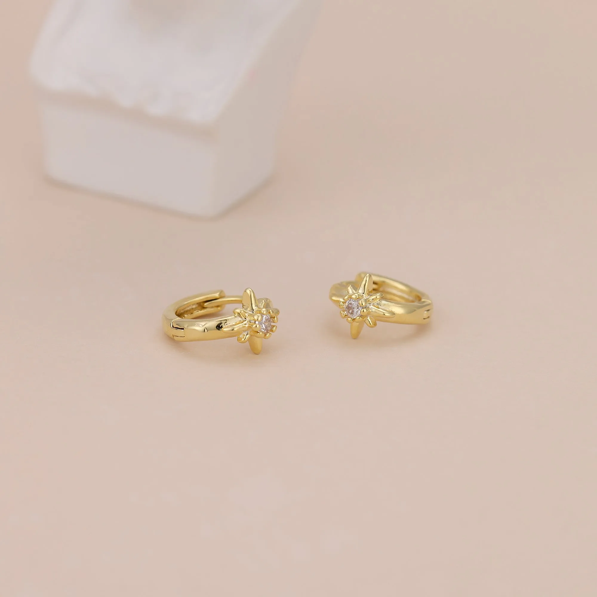 E168 celestial dainty starburst huggie earrings