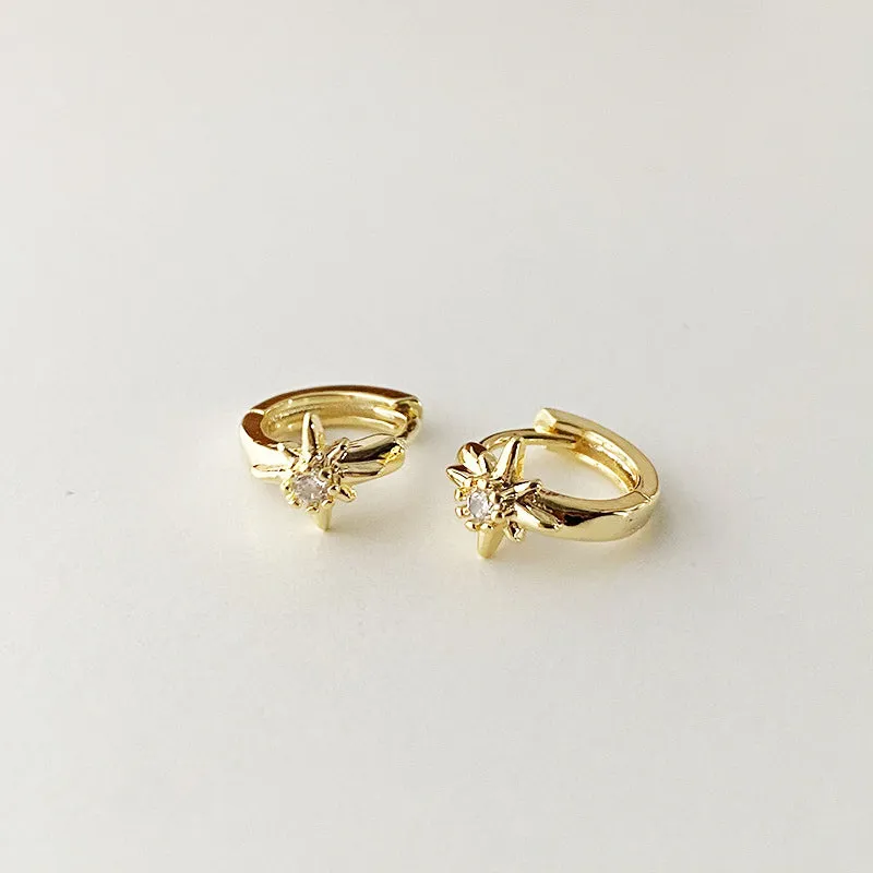 E168 celestial dainty starburst huggie earrings