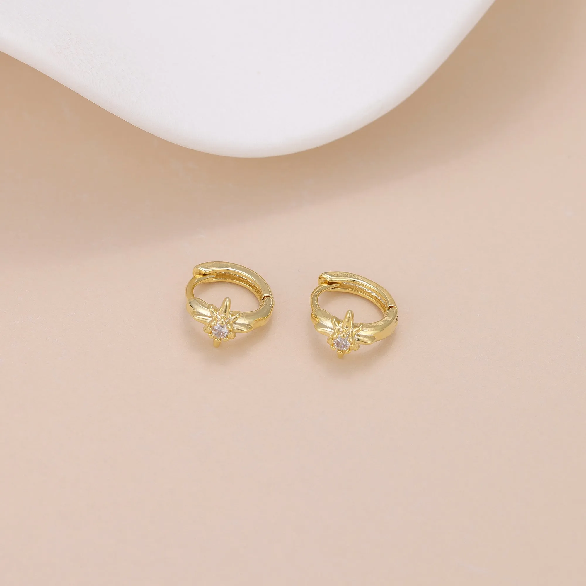 E168 celestial dainty starburst huggie earrings