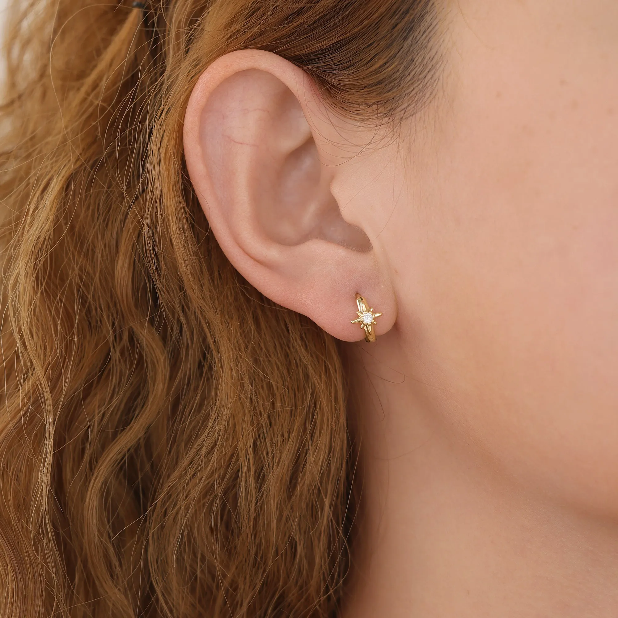 E168 celestial dainty starburst huggie earrings