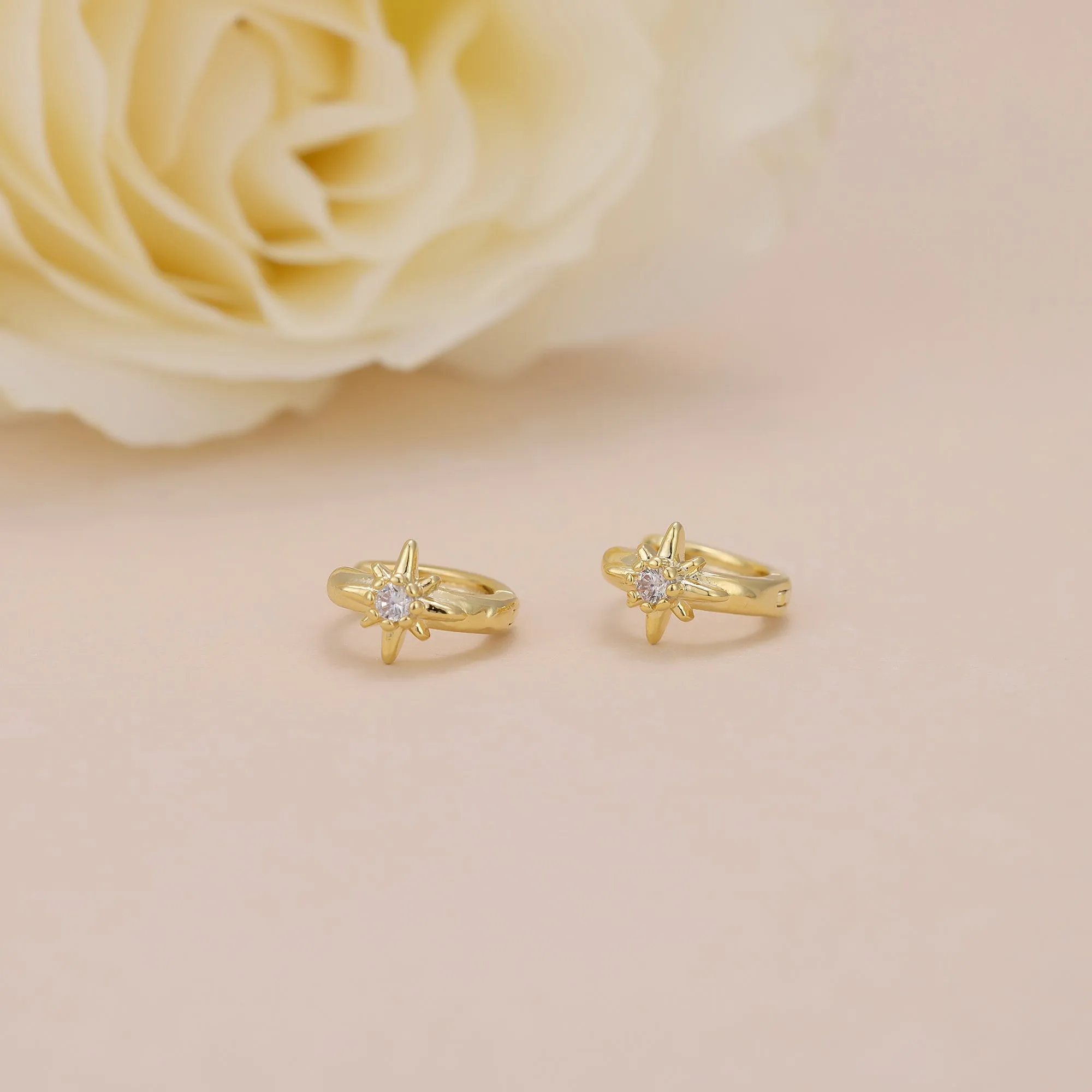 E168 celestial dainty starburst huggie earrings